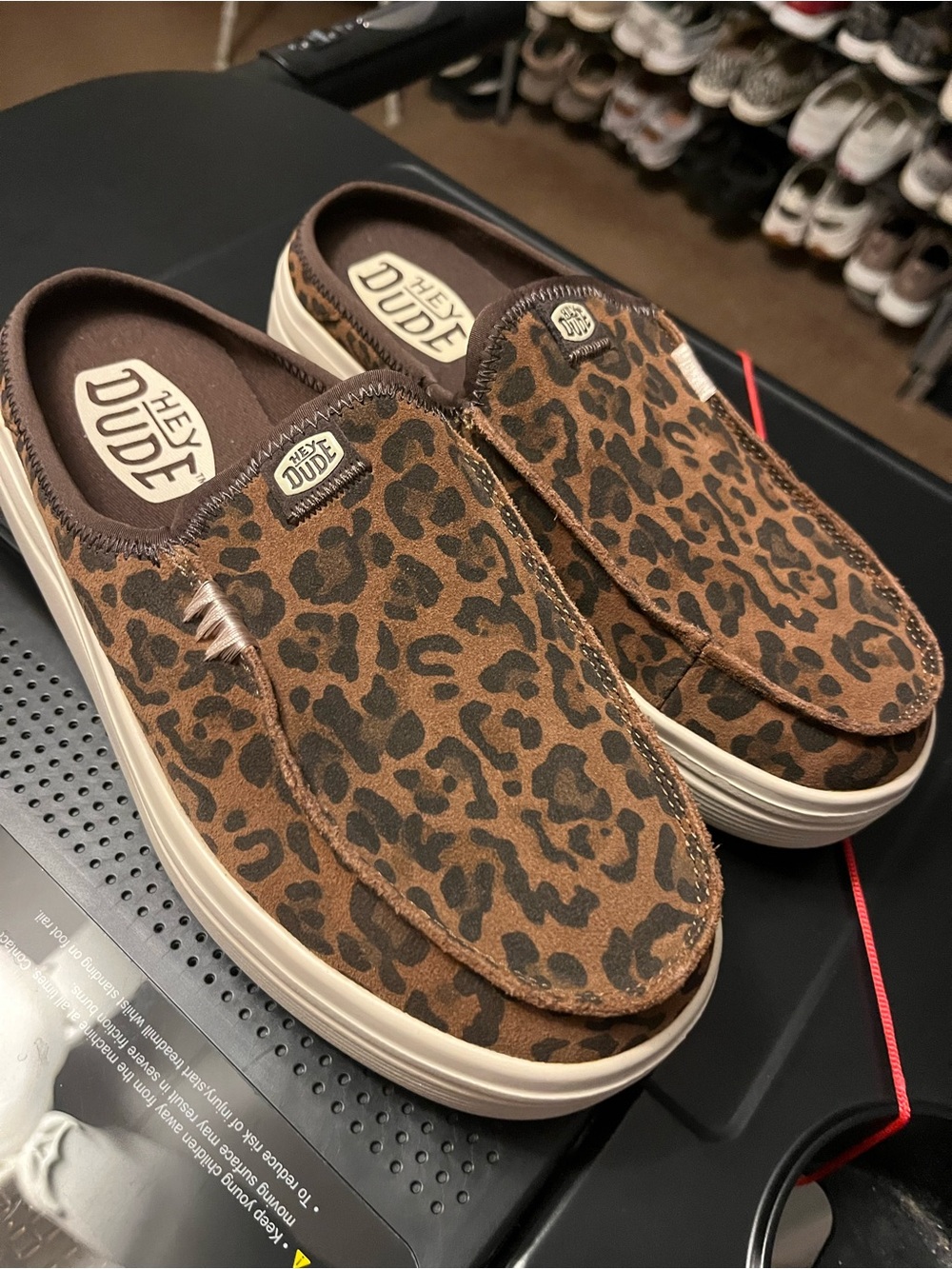 Hey Dude Women’s Leopard Print Slip-On Mules in Brown